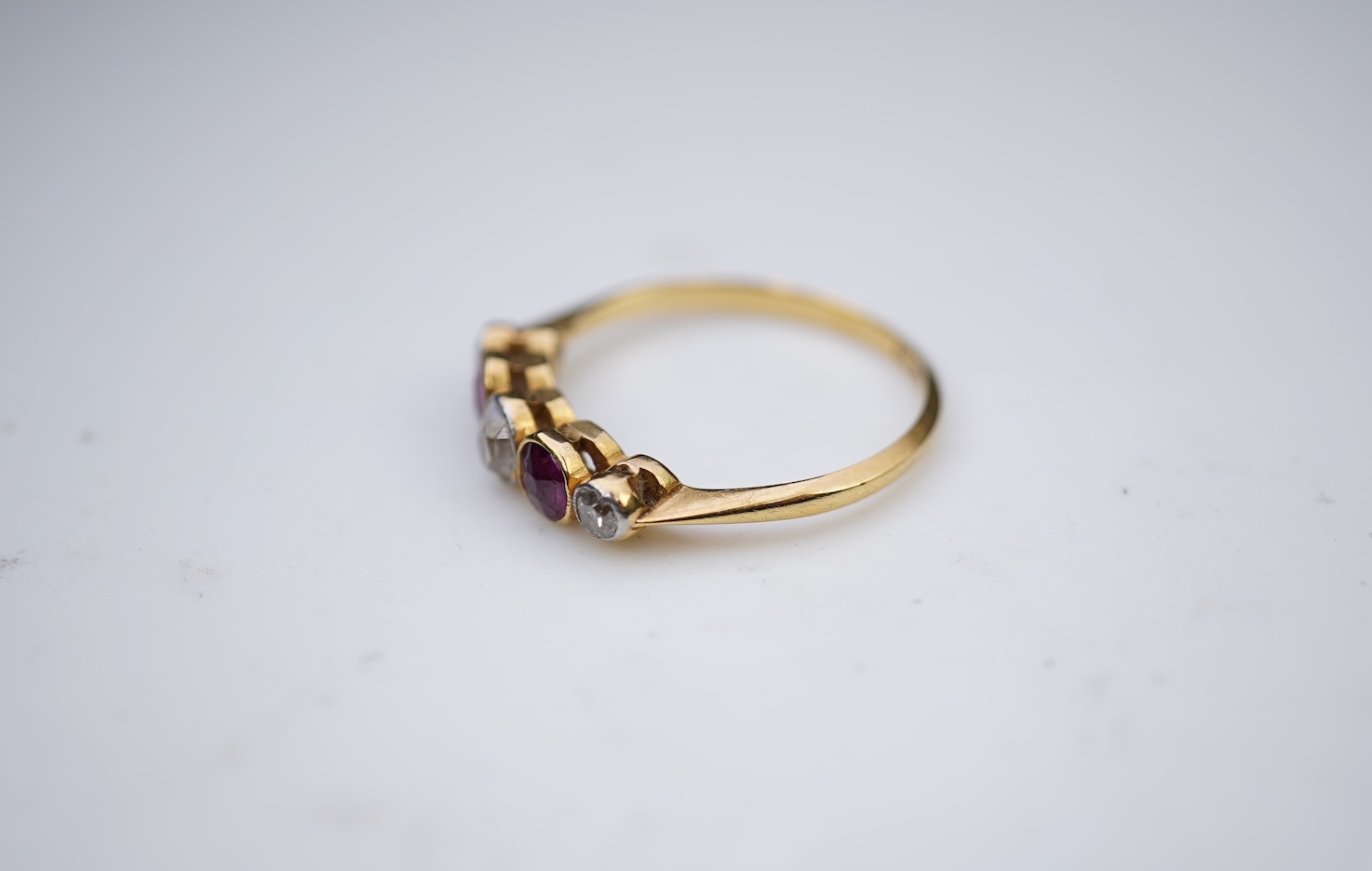 A ruby and diamond five-stone ring, early 20th century